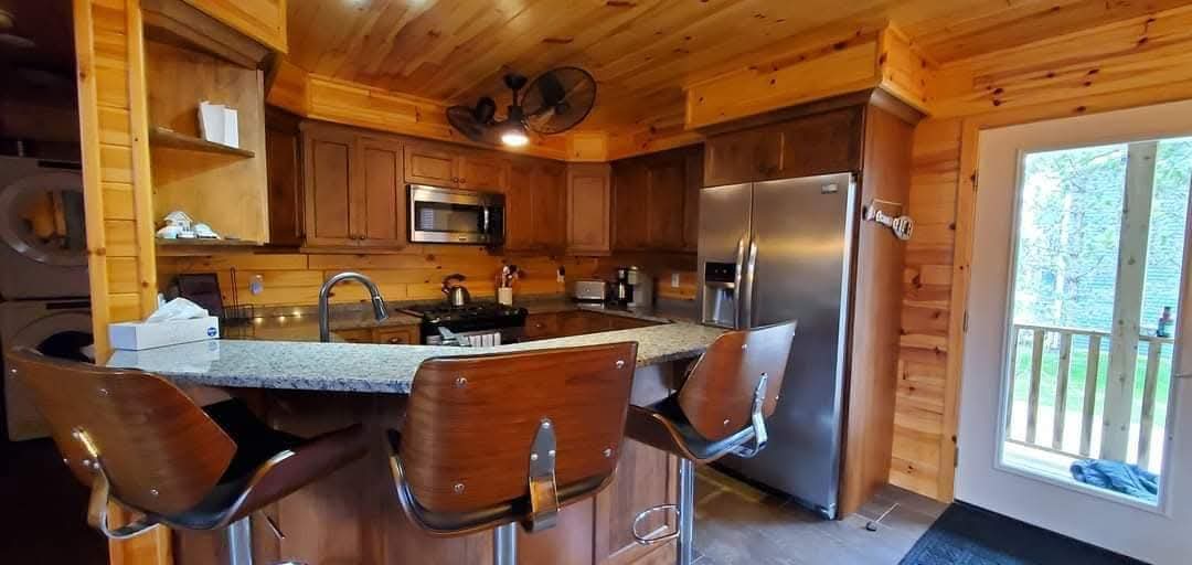 Fully equipped kitchen with stainless steel appliances